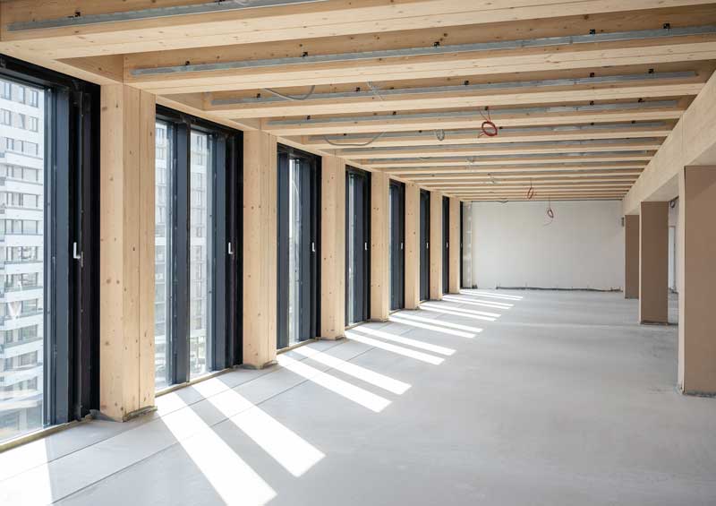 commercial construction loans for real estate - photo of construction site of a sustainable Timber-concrete composite office building
