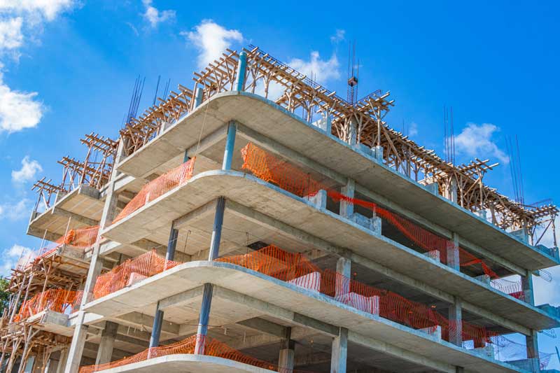 financing for hospitality industry - photo of a hotel being built, under construction.