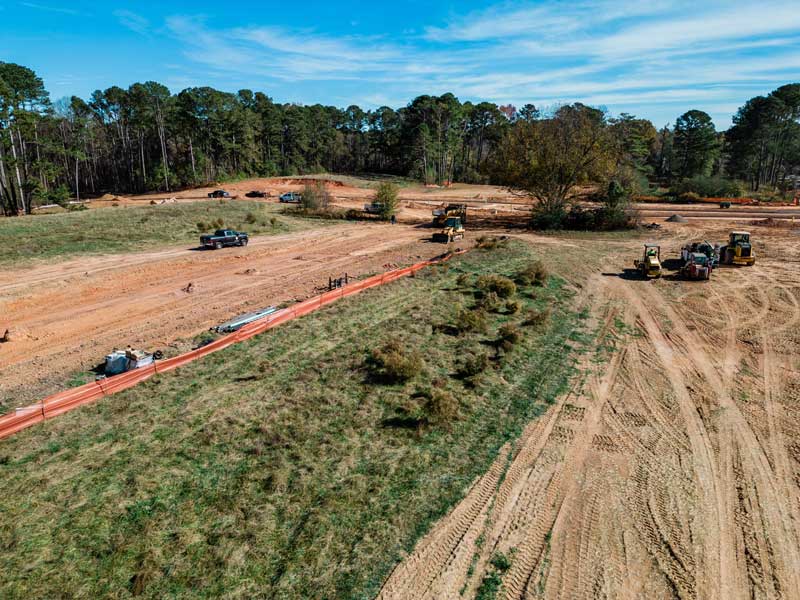 land development loans - aerial photo of land cleared and under development for building